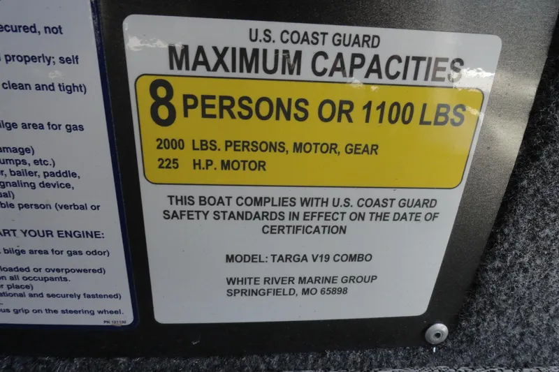 Slide: The Image of U.S. Coast Guard capacity label for 2022 Tracker Targa V-19 Combo boat. - 12