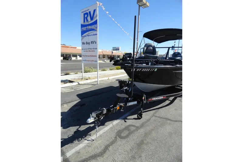 Slide: The Image of 2022 Tracker Targa V-19 Combo boat on trailer at RV dealership. - 26