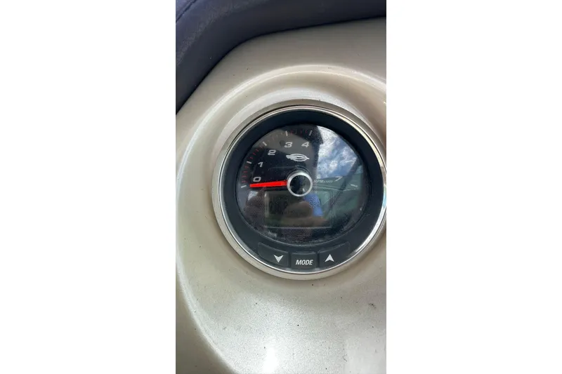 Slide: The Image of Tachometer of 2015 Chaparral 264 Sunesta boat, displaying RPM gauge. - 29