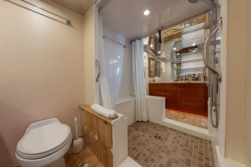 Slide: The Image of Luxurious bathroom interior of 2004 Hatteras 75 Sport Deck Motor Yacht with modern fixtures. - 17