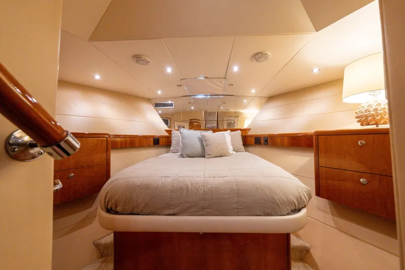 Slide: The Image of Luxurious bedroom interior of 2004 Hatteras 75 Sport Deck Motor Yacht. - 22