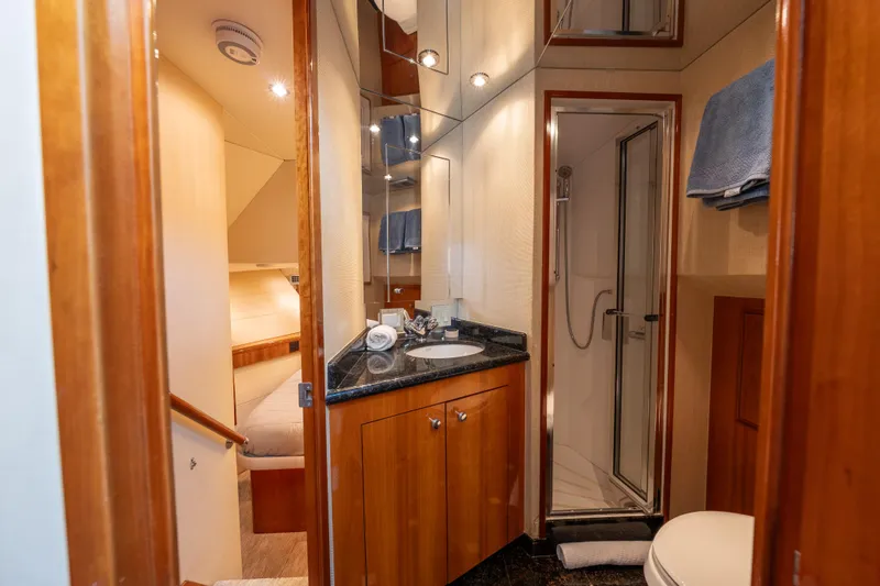 Slide: The Image of Luxurious bathroom interior of 2004 Hatteras 75 Sport Deck Motor Yacht with modern amenities. - 25