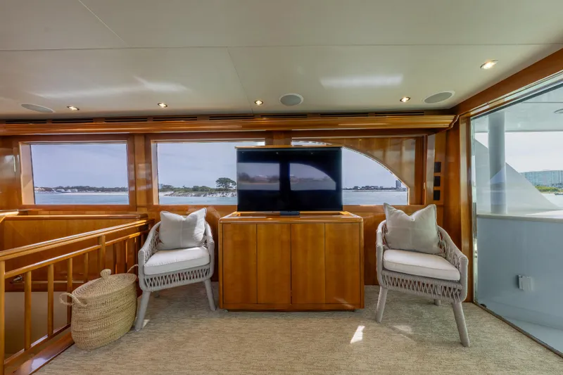 Slide: The Image of Luxurious interior of 2004 Hatteras 75 Sport Deck Motor Yacht with seating and TV. - 3