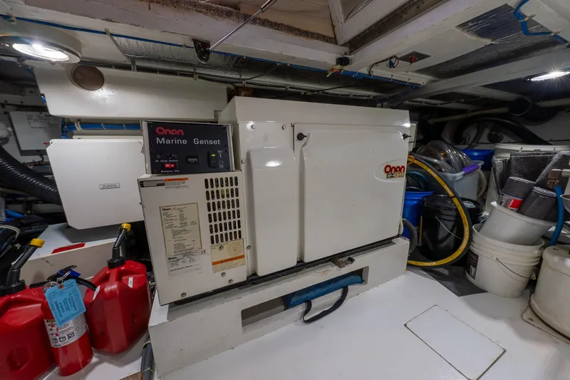 Slide: The Image of Engine room of 2004 Hatteras 75 Sport Deck Motor Yacht with Onan Marine Genset. - 46
