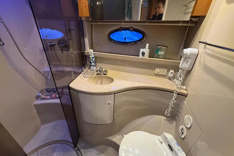 Slide: The Image of Luxurious bathroom in 2002 Regal Commodore 3860 yacht with modern amenities. - 27