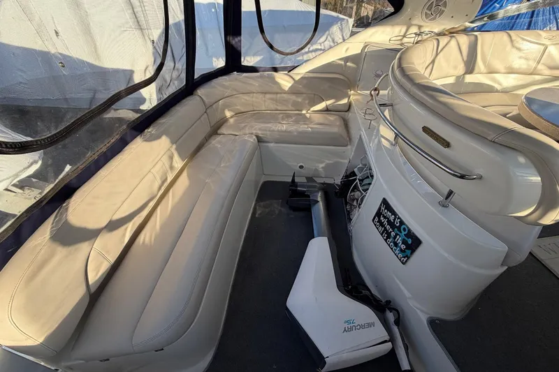 Slide: The Image of Interior of 2002 Regal Commodore 3860 yacht with white leather seating. - 7