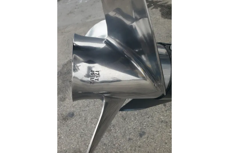 Slide: The Image of Close-up of a shiny propeller on a 2020 Robalo R222 Explorer boat. - 10