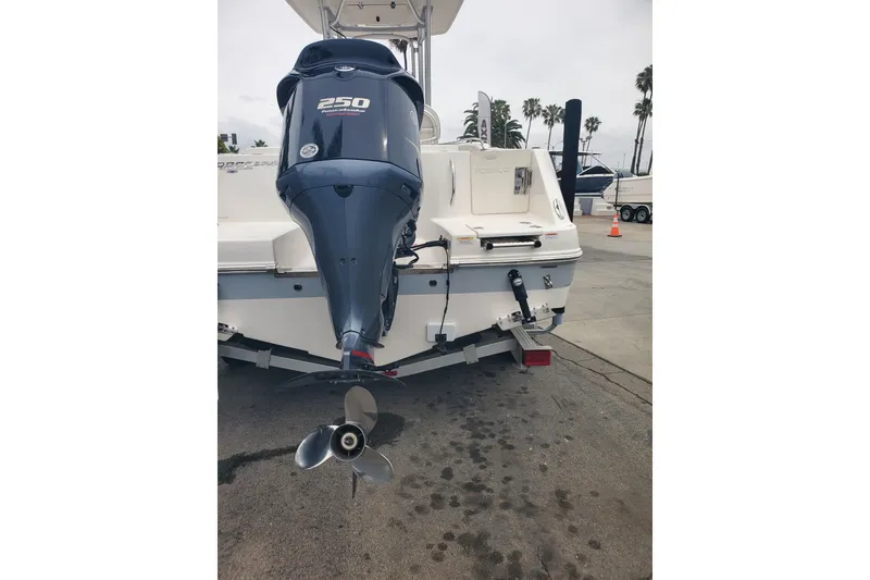 Slide: The Image of 2020 Robalo R222 Explorer boat with powerful 250 horsepower outboard engine. - 12