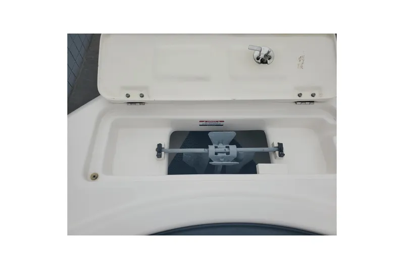 Slide: The Image of Open storage compartment on 2020 Robalo R222 Explorer boat. - 15