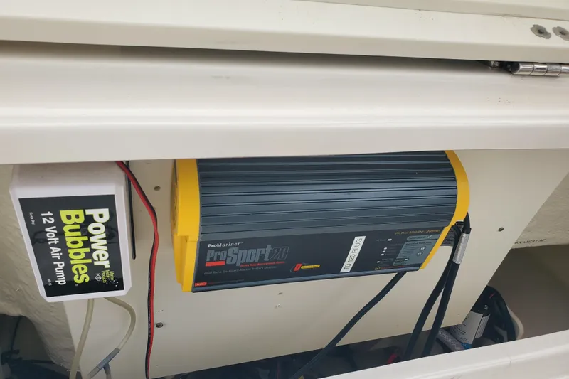 Slide: The Image of 2020 Robalo R222 Explorer with ProMariner ProSport20 charger and Power Bubbles 12V air pump. - 18