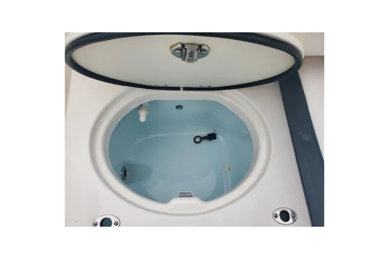 Slide: The Image of Livewell compartment of 2020 Robalo R222 Explorer boat, open lid view. - 19