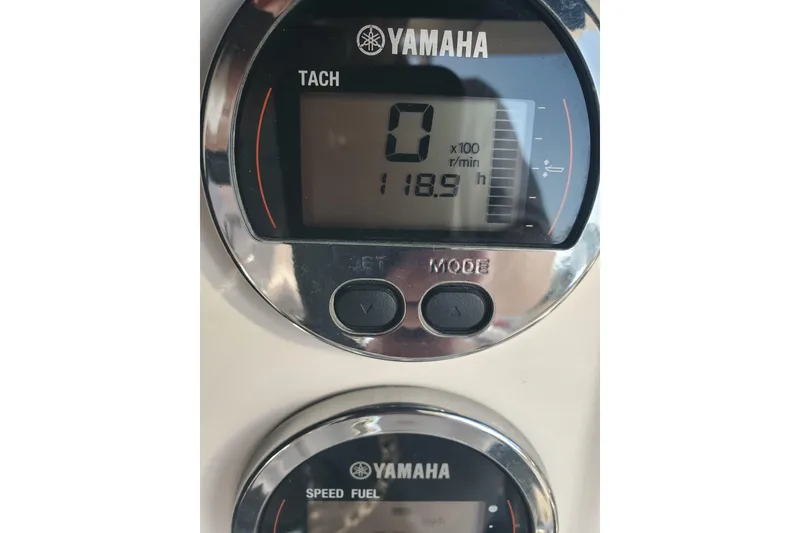 Slide: The Image of Yamaha tachometer display on 2020 Robalo R222 Explorer boat, showing 118.9 hours. - 22