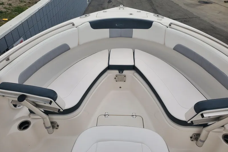 Slide: The Image of 2020 Robalo R222 Explorer boat interior with cushioned seating and sleek design. - 8