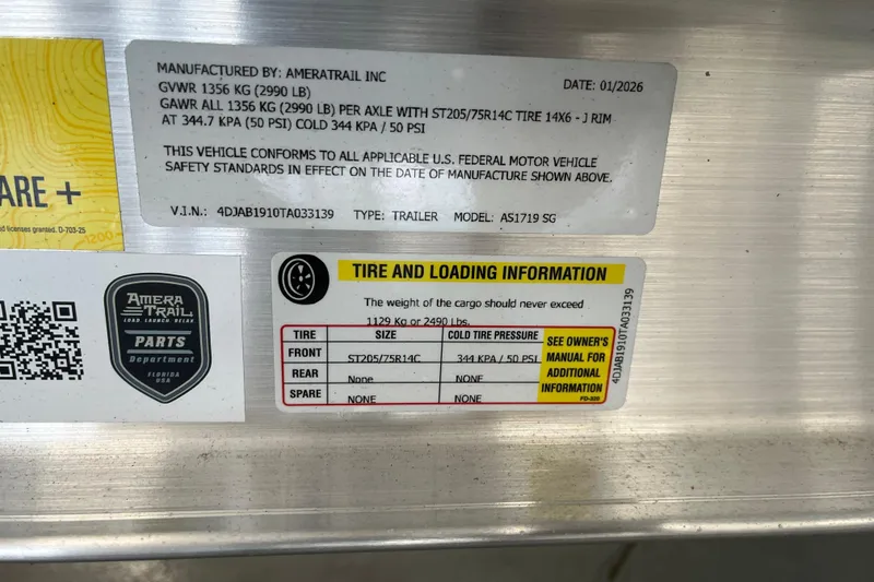 Slide: The Image of Label on a 2026 Bulls Bay 2000 trailer detailing tire and loading information. - 3