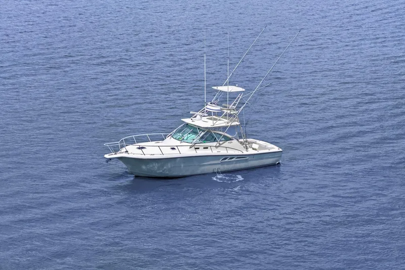 The Image of 2005 Rampage 38 Express boat on calm blue ocean waters. - 0
