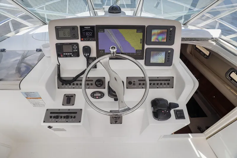 Slide: The Image of Helm of 2005 Rampage 38 Express boat with navigation and control systems. - 28