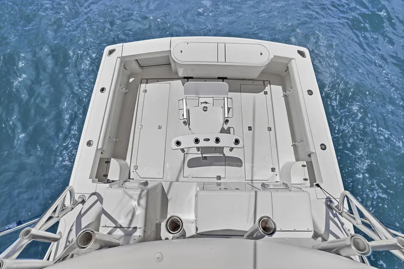 Slide: The Image of 2005 Rampage 38 Express boat deck, aerial view over blue ocean water. - 33