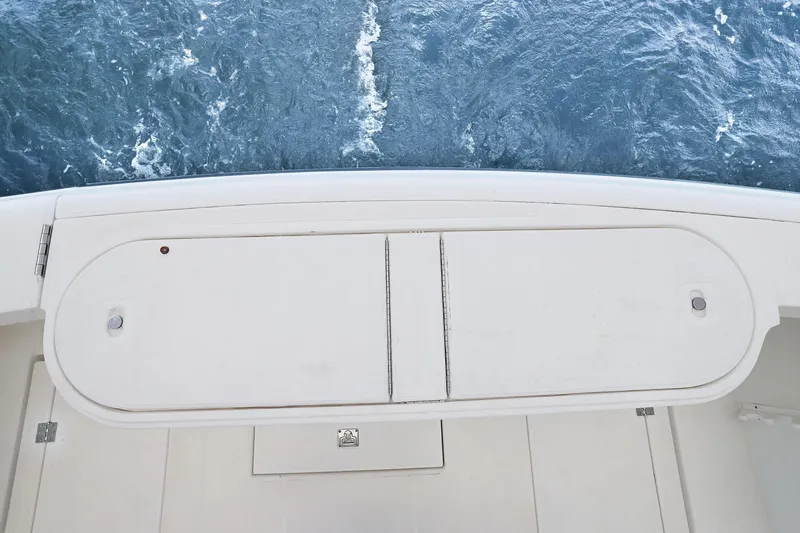 Slide: The Image of 2005 Rampage 38 Express boat deck with ocean view. - 42