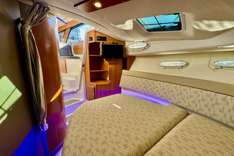 Slide: The Image of Luxurious interior of 2022 Cutwater C-32 CB boat with cozy seating and modern amenities. - 13