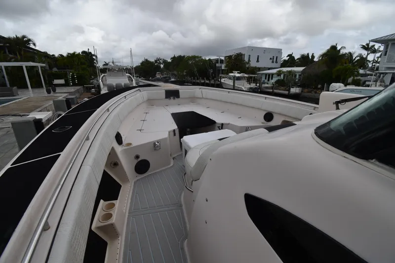Slide: The Image of 2010 Grady-White Canyon 366 boat interior with spacious deck and seating. - 6