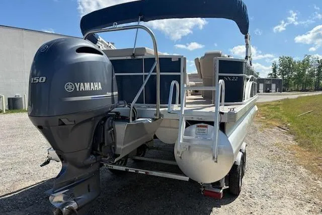 Slide: The Image of 2017 Bennington 22SLX pontoon boat with Yamaha 150 engine on a trailer. - 5
