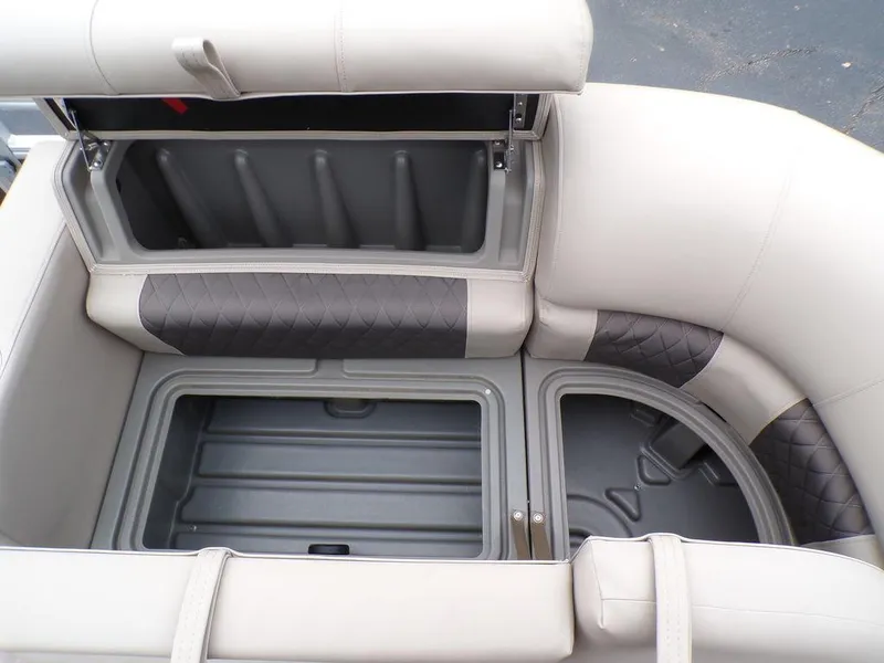 Slide: The Image of 2024 Sun Tracker SportFish™ 22 DLX storage compartments and seating. - 27