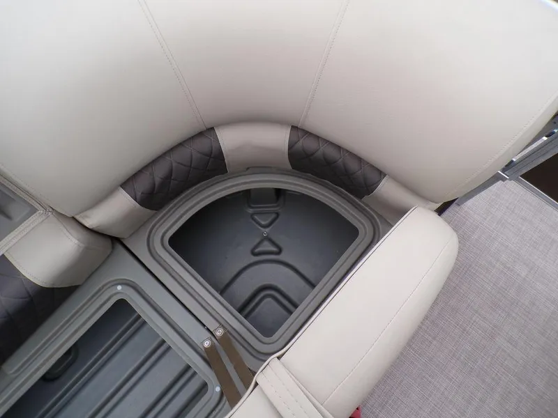Slide: The Image of 2024 Sun Tracker SportFish™ 22 DLX boat seat storage compartment. - 29