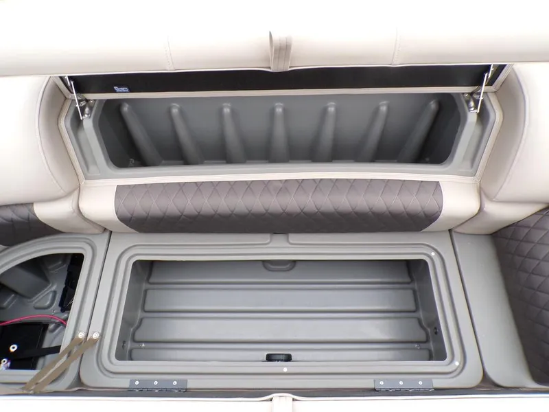 Slide: The Image of 2024 Sun Tracker SportFish™ 22 DLX storage compartments and seating. - 30