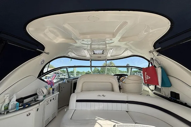 Slide: The Image of Interior view of 2006 Sea Ray 44 Sundancer yacht with seating and helm. - 7