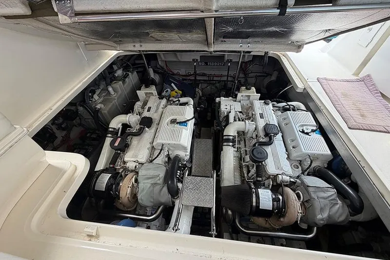 Slide: The Image of Engine compartment of a 2006 Sea Ray 44 Sundancer, showcasing dual engines. - 8