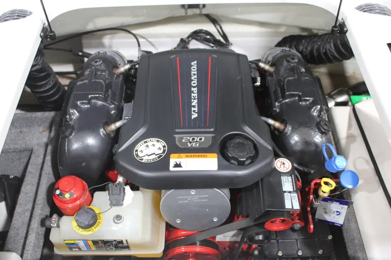 Slide: The Image of 2017 Glastron GT 205 boat engine, featuring a Volvo Penta 200 V6 motor. - 10