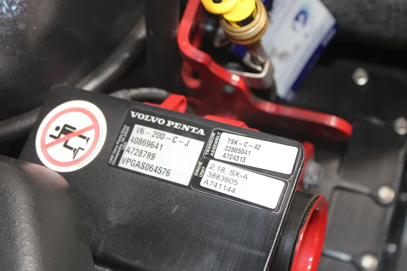 Slide: The Image of Volvo Penta engine label on 2017 Glastron GT 205 boat, featuring model and serial numbers. - 11