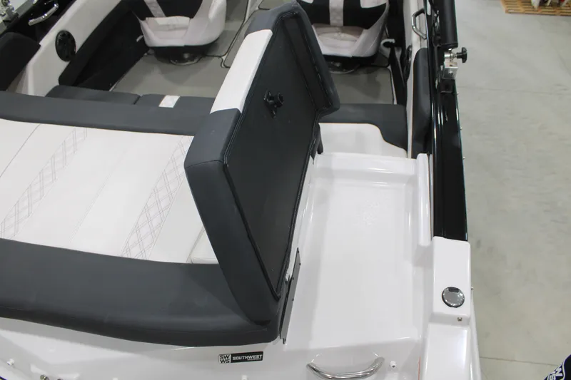 Slide: The Image of 2017 Glastron GT 205 boat interior with white and black seating arrangement. - 9