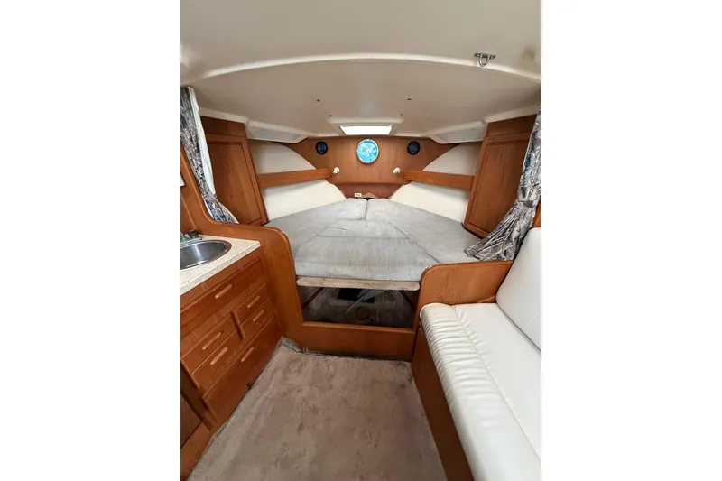 Slide: The Image of Interior of 1999 Luhrs Tournament 320 Open boat with cozy cabin layout. - 32