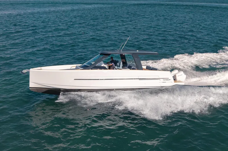 The Image of 2026 Fjord 39 XP yacht cruising on open water, showcasing sleek design and performance. - 0