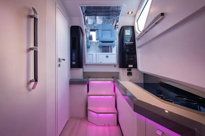 Slide: The Image of Modern interior of 2026 Fjord 39 XP yacht with illuminated stairs and sleek design. - 12