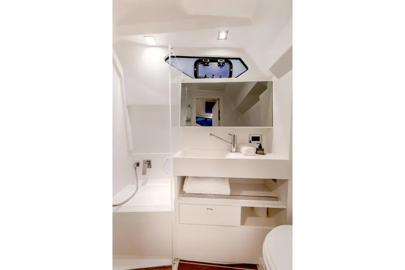 Slide: The Image of Modern bathroom interior of 2026 Fjord 39 XP yacht, featuring sleek design and compact amenities. - 14