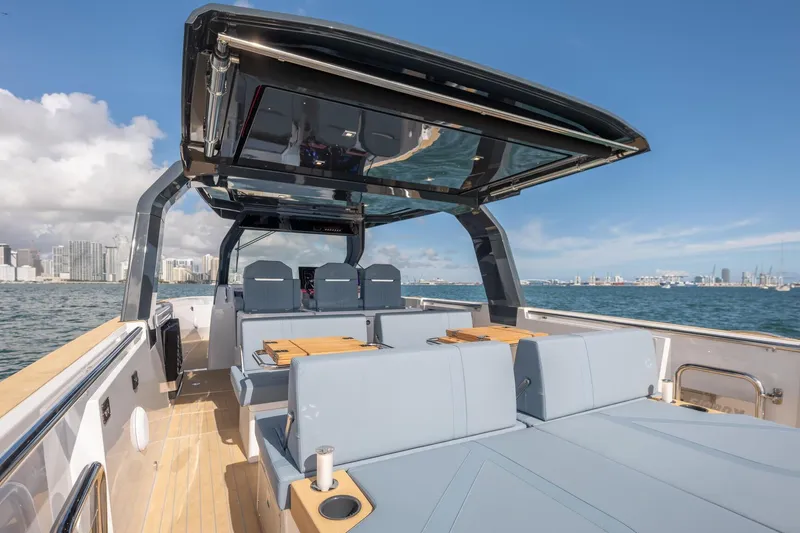 Slide: The Image of Luxurious 2026 Fjord 39 XP yacht interior with city skyline in background. - 9