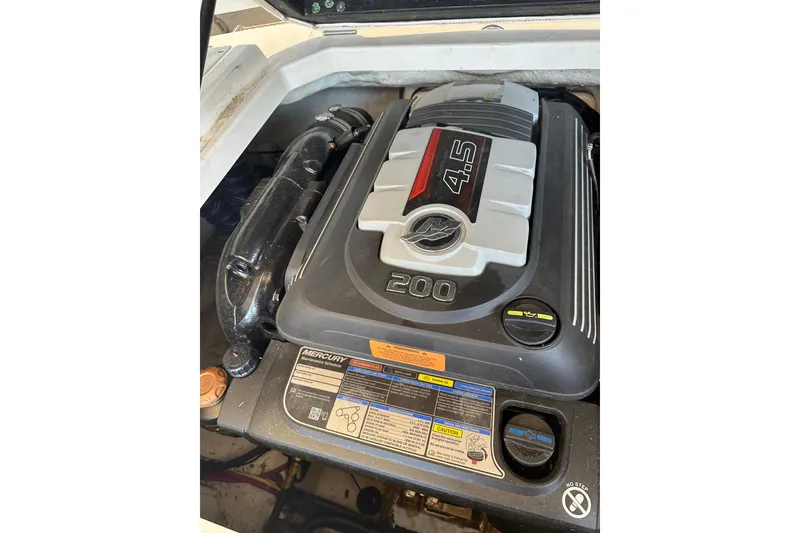 The Image of Engine compartment of 2020 Chaparral 19 SSi with Mercury 4.5L 200 HP engine. - 1