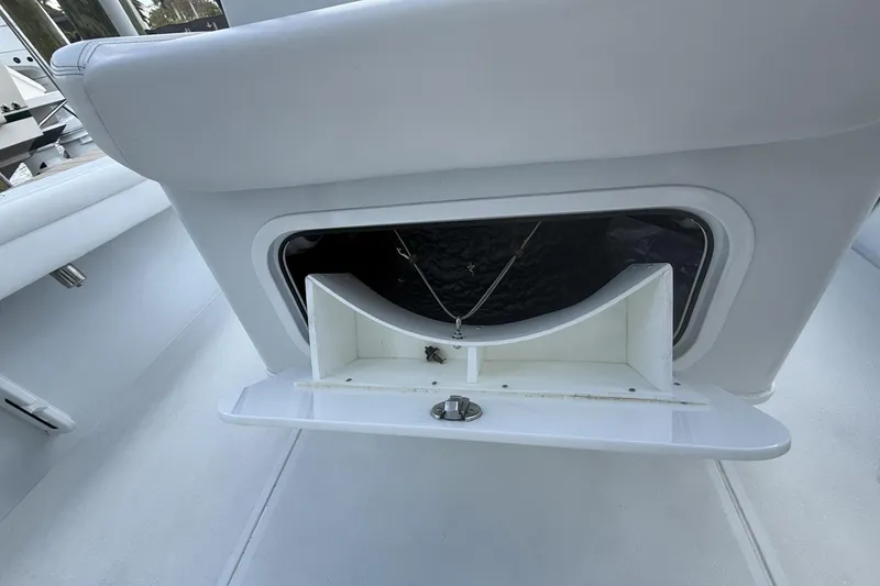 Slide: The Image of 2023 Yellowfin 26 Hybrid boat storage compartment with open hatch. - 21