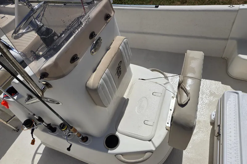 Slide: The Image of 2017 Carolina Skiff 198 DLX boat interior with console and seating area. - 15