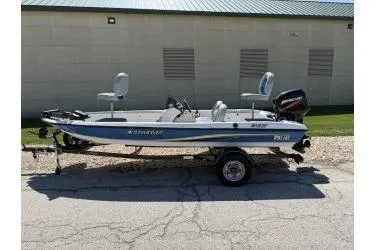 The Image of 2007 Stratos 176 XT fishing boat with trailer, parked outdoors. - 1