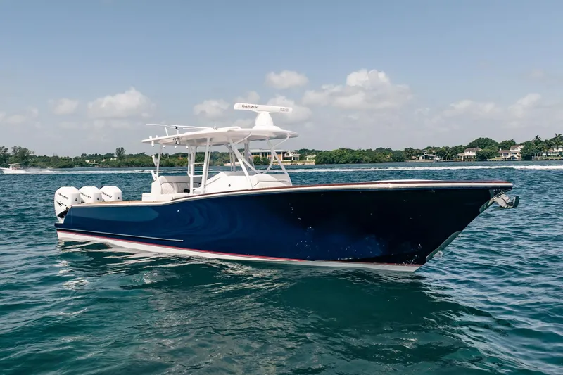 The Image of 2018 Bonadeo 37 WACC boat on calm water, featuring sleek design and powerful engines. - 1