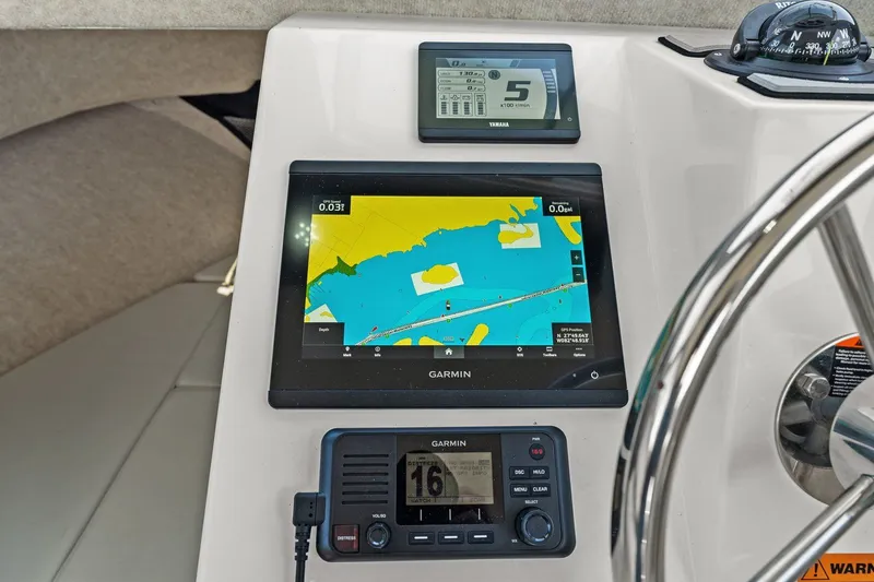 Slide: The Image of 2024 Parker 2320 Sport Cabin with Garmin navigation system. - 47