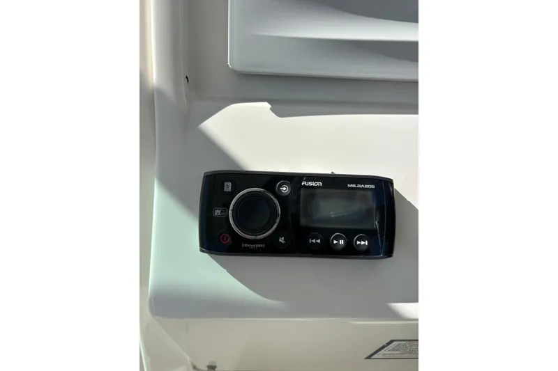 Slide: The Image of Fusion MS-RA205 marine stereo on 2015 Sailfish 275 DC boat dashboard. - 11