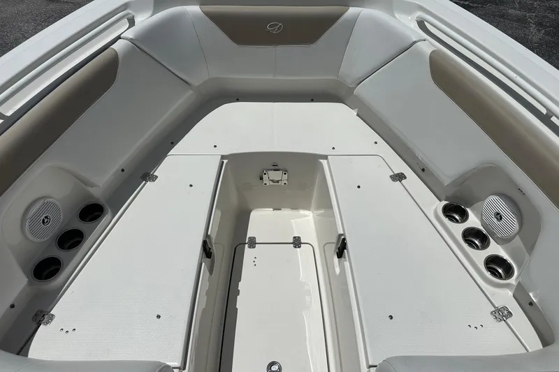 Slide: The Image of Spacious interior of 2015 Sailfish 275 DC boat with seating and cup holders. - 15