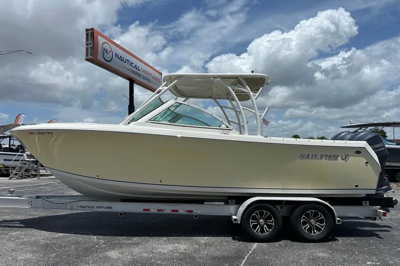 The Image of 2015 Sailfish 275 DC boat on trailer at Nautical Ventures Marine Center. - 0