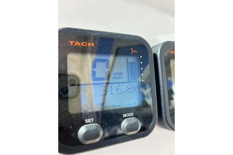 Slide: The Image of Close-up of a tachometer display on a 2015 Sailfish 275 DC boat. - 9