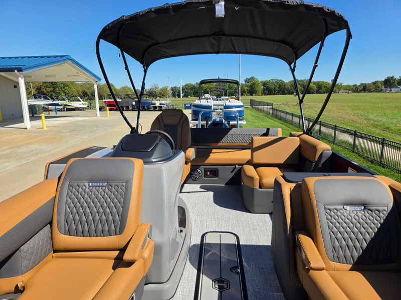 Slide: The Image of The image shows the interior of a 2027 Harris Sunliner 230 with luxurious seating. - 8