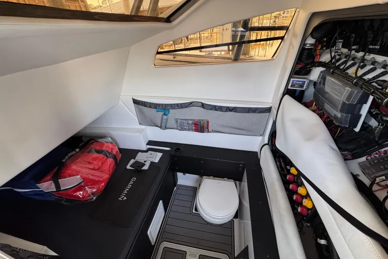 Slide: The Image of 2022 Nor-Tech 392 Super Fish boat interior with sleek design and spacious deck. - 9